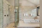 En suite bathroom with separate tub